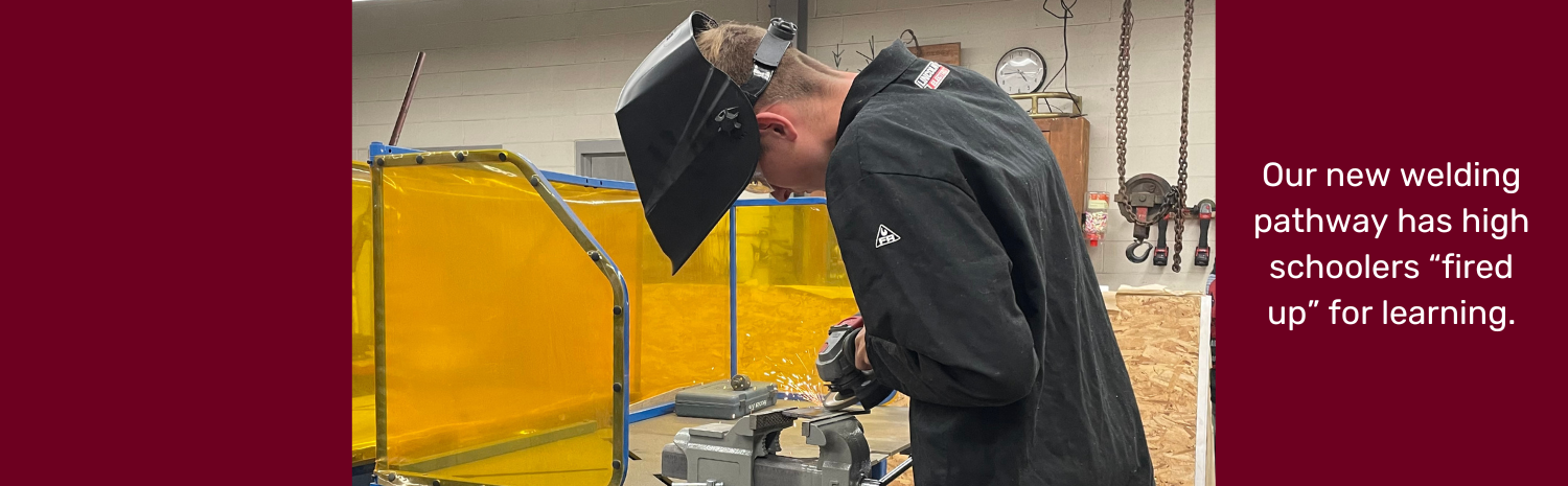 Sparks fly as a high school student wearing protective clothing and a helment welds in a Fort Plain High School classroom. A sentence that reads "Our new welding pathway has high schoolers "fired up" for learning" is featured on this graphic.